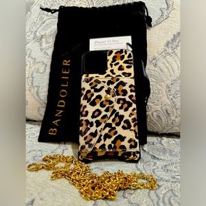 Bandolier Iphone case and strap.  Fits iPhone 11 pro.